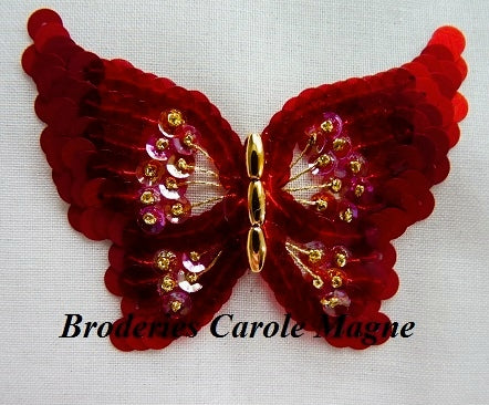 Carole Magne - Le papillon rouge en paillettes et cuvettes